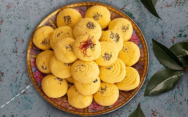 Persian Rice Cookie, also known as Nan Berenji is originally from kermanshah. This sweet is amde with flour, sugar and a type of solid oil