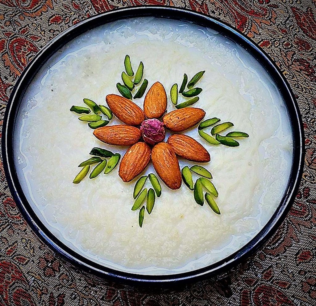 almond and pistachio are used for topping shir berinj.