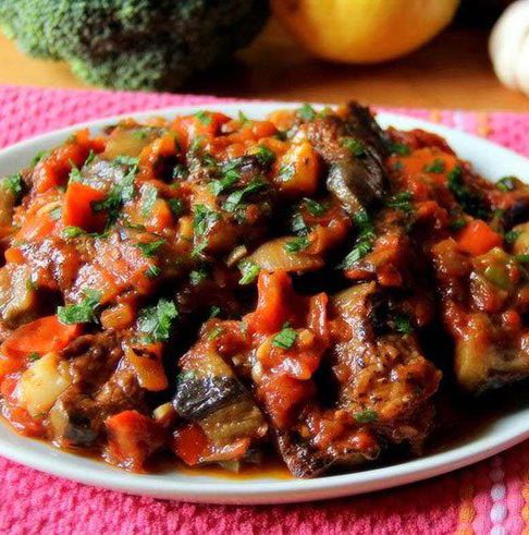 yatimcheh is an iranian stew like dish cooked with eggplant, tomatoes and garlic.