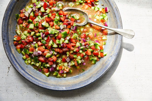 a bowl of salad shirazi